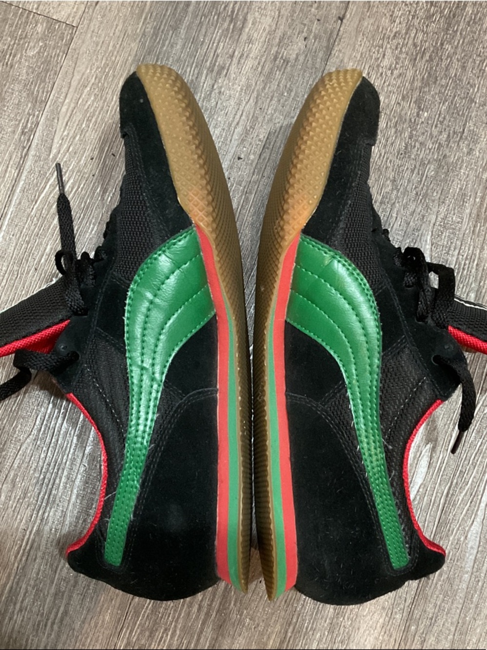 Authentic 💯 Puma Black Sneakers with Green Stripe and Red Accents